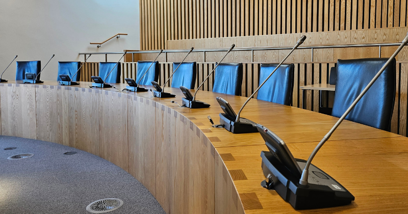 Runnymede Council Chamber, chairs and microphones.